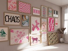 there are many pictures on the wall with pink and black designs in them, including zebras