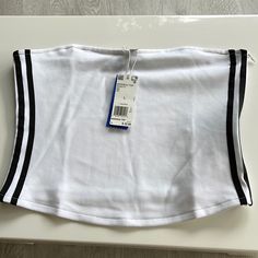 New Adidas White Black Stripe Bandeau Top Strapless. Size Large. Side Zipper. Easy To Put On And Remove. Length: Approx 11.5”. Armpit To Armpit: Approx 18”. White Bandeau Tank Top, Trendy White Strapless Tank Top, White Strapless Cotton Crop Top, Casual White Strapless Crop Top, White Cotton Sleeveless Tube Top, Sporty Bandeau Tube Top For Summer, White Stretch Crop Tube Top, White Casual Crop Tube Top, White Bandeau Crop Top Casual