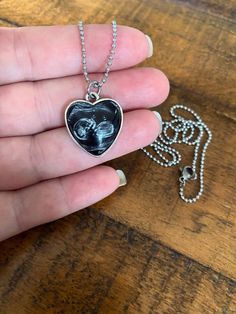 "NOW OFFERING FREE SHIPPING ON MOST ITEMS! ❤️ BEST GIFT EVER ❤️ This is SO CUTE! Petite heart shaped sonogram necklace - Heart shaped BABY SONOGRAM necklace, Sonogram necklace, Baby sonogram jewelry, baby sonogram charm, your baby's sonogram photo, sonogram keychain *Shown with Stainless Steel Ball Chain (24\" in length) Dimensions: Heart is 18 MM -loop has approx. 2mm opening. -approx 1-2mm deep Custom Sonogram Keychain or pendant. *This is a one sided pendant or keychain If you would like just Baby Sonogram, Baby Ultrasound, Pocket Token, Custom Cufflinks, Best Gift Ever, First Fathers Day, Baby Memories, Small Gift Boxes, Necklace Heart