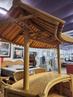 the inside of a store with wooden furniture