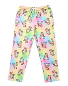 Show off your cute and cuddly style with these officially licensed Care Bears Lounge Pants. These soft pants feature Togetherness Bear's Pastel coloring and are perfect for relaxing all day long. Officially licensed Exclusively at Spencer's Elastic waistband Front pockets Drawstring closure Material: Polyester Care: Machine wash Imported Playful Cotton Sweatpants For Loungewear, Playful Relaxed Fit Sweatpants For Loungewear, Playful Sweatpants With Elastic Waistband For Loungewear, Multicolor Sleep Bottoms With Elastic Waistband, Casual Multicolor Sleep Bottoms, Casual Cartoon Print Pants For Loungewear, Casual Multicolor Sleepwear With Elastic Waistband, Casual Bottoms With Elastic Waistband For Sleepover, Playful Cartoon Print Bottoms For Sleepover