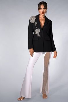 Elegant black blazer adorned with heavy-duty rhinestones-studded 3D floral motifs. Elevate your charm and style for special events, formal occasions, and fashion-forward gatherings. Handmade customization Fabric composition: 90% polyester fiber, 10% spandex Washing method: hand wash or dry clean Popular elements: floral Elegant Embellished Evening Blazer, Elegant Evening Embellished Blazer, Elegant Evening Blazer With Rhinestones, Spring Wedding Embellished Blazer, Elegant Fitted Blazer With Rhinestones, Chic Tailored Embellished Blazer, Spring Glamorous Embellished Blazer, Elegant Party Blazer With Rhinestones, Luxury Embellished Blazer For Evening