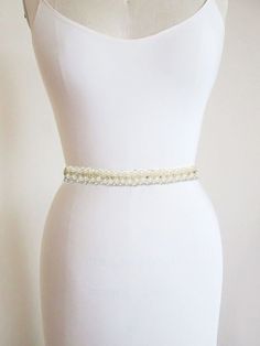 2022 Luxurious Beaded Belts to Adorn Your Clothes More details in tulleandchantilly Elegant Silver Bridal Belt For Prom, Glamorous Bridal Belt With Rhinestones For Party, Glamorous Party Bridal Belt With Rhinestones, Elegant Embellished Bridal Belt For Party, Elegant Fitted Bridal Belt, Elegant Crystal Bridal Belt For Formal Occasions, Elegant Formal Bridal Belt, Adjustable Bridal Belt For Wedding, White Bridal Belt With Rhinestones For Party