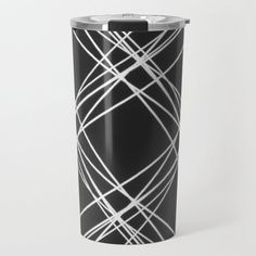 a black and white cup with some lines on it's side, in front of a white background