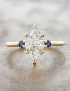 caption:1.40ct marquise diamond Engagement Ring With Hidden Halo, Sapphire Side Stones, Peach Sapphire, Lab Diamond Engagement Ring, Sapphire Wedding, Montana Sapphire, Three Stone Engagement, Yellow Gold Setting, Three Stone Engagement Rings