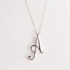 "Letter A Initial Necklace - Cursive \"A\" initial silver pendant - Personalized initial silver pendant for women / Gift for her / for mom Dainty \"A\" initial. Perfect every day necklace. Lovely gift for your self, sister, bridesmaids, new mom. Convo me if you would like to customize the length of the chain. The possibilities are endless. Pendant: Base metal is brass and 16K gold plated. Chain is 18 inches, sterling silver. (if you would like a longer or shorter chain, please contact us to cust Mother's Day Sterling Silver Initial Pendant Charm Necklace, Mother's Day Sterling Silver Charm Necklaces, Mother's Day Silver Initial Pendant Necklace, Silver Initial Pendant Jewelry For Everyday, Silver Minimalist Initial Pendant Necklace, Minimalist Silver Initial Pendant Necklace, Silver Minimalist Personalized Initial Necklace, Silver Hypoallergenic Initial Pendant Jewelry, Silver Minimalist Initial Necklace