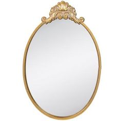 an oval gold mirror with ornate detailing