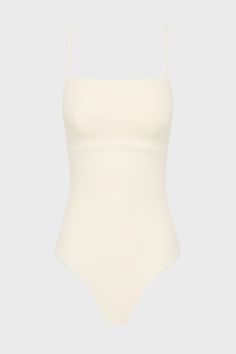 The Aerin One Piece in Pearl is an elegant, contemporary swimsuit with a flattering square neckline. With a bust panel, hidden under-bust support and removable cups, Aerin is supremely flattering to a woman's figure. Cut from our technically advanced Sculpteur® fabric with 3-D stretch, Aerin will support the bust and streamline the body. A chic swimsuit that idea for larger busts, suiting cup sizes B to DD. Luxury fabric sustainably made in Italy. Shaping Swimwear With Built-in Bra For Summer, Summer Swimwear With Built-in Bra And Straight Neckline, White Square Neck Swimwear For Swimming, Elegant Swimwear With Lined Body And Minimal Stretch, White Square Neck Swimwear For Beach, Elegant Summer Bodysuit With Minimal Stretch, Summer Shapewear For Swimming, Elegant Bodysuit With Minimal Stretch And Lined Body, Elegant Bodysuit With Minimal Stretch