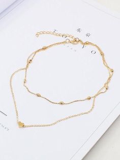 Sku CY-!19645 Material Alloy Occasion Going out , Casual , Vacation , Bohemia , Beach Seasons Spring , Summer , Autumn , Winter Type Necklaces Accessories Color SILVER,GOLD Size FREE SIZE Size chart: Please consult the size chart we provide for this item's measurements to help you decide which size to buy. Trendy Gold Charm Necklaces For Valentine's Day, Gold Heart Beads Choker Jewelry, Gold Heart Beads Choker Necklace, Gold Heart Beaded Choker Jewelry, Trendy Gold Necklaces For Valentine's Day, Gold Heart Charm Necklace In Alloy, Trendy Gold Necklace For Valentine's Day, Gold Alloy Necklace With Heart Charm, Valentine's Day Gold Alloy Necklaces