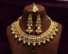 *Light Weight Gold white,Ruby pink Kundan Choker Adjustable necklace set with earrings and tikka. *Studded with kundan stone. *D.no.1-Gold white *Light Weight Gold kundan necklace. *Necklace widht- 1.1 inches (included pearl drop) *Earrings Length- 2.5 inches(included pearl drop) *Breadth- 1.6 inches *D.no.2- gold white *Light Weight gold kundan necklace. *Necklace widht- 1.5 inches (included pearl drop) *Earrings Length- 3.2 inches(included pearl drop) *Earrings Breadth- 1.1 inches White Bollywood Jewelry For Marriage, White Hand Set Kundan Bridal Earrings, White Kundan Necklaces For Marriage, White Kundan Bridal Sets, White Kundan Bridal Sets For Marriage, Traditional White Kundan Necklace For Marriage, Bollywood Style White Bridal Sets With Latkans, White Jewelry Sets For Wedding And Diwali, White Latkans Necklace For Wedding