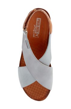 A cushioned sandal with a low cork-textured wedge and crossover straps is meant for all-day comfort. 1 1/4" heel; 1/2" platform (size 39) Adjustable hook-and-loop strap Leather upper and lining/synthetic sole Imported Women's Shoes Comfortable Wedges Sandals, Arch Support Sandals, Outfits Jeans, Whimsical Paintings, Trendy Sandals, Closed Toe Sandals, Sandal Women, Platform Sandals, Nice Shoes