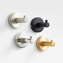 three different types of knobs and handles on a white wall