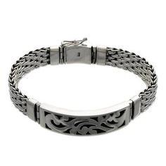 Silver finds paths of elegance through Wayan Asmana's art. The Balinese designer celebrates his country's historic masculine jewelries with the lavish fretwork that adorns this sterling bracelet. .925 Sterling silver Masculine Jewelry, Black Rubber Bands, Silver Link Bracelet, Sterling Bracelets, Jewelry Techniques, Silver Engraving, Sterling Silver Mens, Balinese, Pendant Bracelet