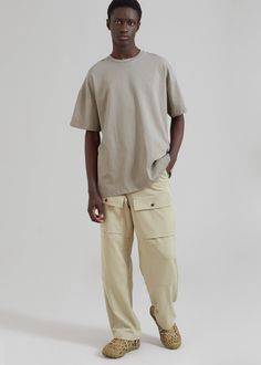 Color: Slate Green Lightweight woven fabric Relaxed fit Front flap pocket detailing Darted and paneled leg detailing Slant hip pockets Back flap patch pockets with button closure Front button closure Zip fly Unlined 78% Polyester 17% Rayon 5% Spandex Dry Clean By The Frankie Shop. Imported Relaxed Fit Cargo Pants With Welt Pockets For Streetwear, Urban Style Workwear Pants With Flap Pockets, Urban Pants With Pockets And Straight Hem, Urban Style Pants With Flap Pockets For Work, Casual Cargo Pants With Side Pockets And Straight Hem, Solid Pants With Side Pockets And Straight Hem, Urban Khaki Pants With Patch Pockets, Urban Khaki Bottoms With Patch Pockets, Utility Style Cargo Pants With Straight Hem