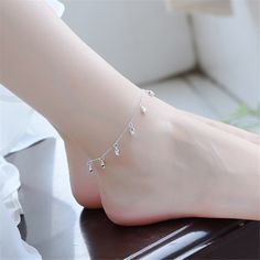 Show off your pedicure and add touch of light-catching shine to your ensemble with this elegant anklet plated in gleaming sterling silver. 0.35'' W x 9.84'' L S-hook clasp Fine silver-plated copper Sterling Silver Anklets, Elegant Anklet, Charm Anklet, Silver Bracelets For Women, Rose Bracelet, Sterling Silver Anklet, Rose Bud, S Hook, Silver Anklets