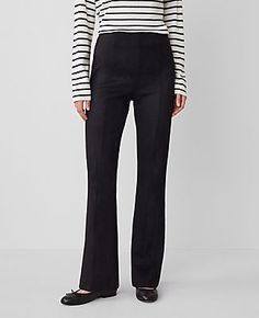 Elevate your wardrobe with the Ann Taylor Faux Suede Skinny Flare Pants, a chic blend of contemporary design and classic elegance. These pants are meticulously crafted to enhance your silhouette, featuring a high-rise waist that sits just below the natural waistline, and a flare leg that begins at the knee for a dramatically stylish finish.

- Size: 10
- Color: Black
- Material: 96% Polyester, 4% Spandex
- Fit: Tailored and fitted with a flared leg
- Length: Full length with a 31" inseam and 18 Suede Flare Pants, Women's Black Dress, Flare Pant, Dress Pant, Classic Elegance, Flare Pants, Effortless Style, Side Zipper, Fit And Flare