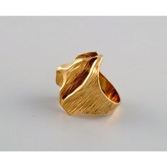 Ole Lynggaard, Danish goldsmith. Modernist vintage ring in 18 carat gold. 1960/70s. Diameter: 16 mm. US size: 5.5. In excellent condition. Stamped. Weight: 15 grams. This piece is attributed to the mentioned designer/maker. It has no attribution mark and no   official proof of authenticity,   however it is well documented in design history. I take full responsibility for any authenticity         issues arising from misattribution Modernist 14k Gold Ring For Formal Occasions, Formal Modernist 14k Gold Ring, Modernist Hallmarked Wedding Rings, Vintage Yellow Gold Wide Band Ring For Anniversary, Modernist Open Signet Ring For Formal Occasions, Modernist Yellow Gold Rings For Formal Occasions, Vintage Yellow Gold-plated Rings, Vintage Style Gold-plated Yellow Gold Ring, Modernist Yellow Gold Wedding Jewelry