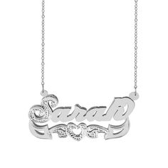 Bold, bright, and beautiful are the first words that come to mind when seeing this stunning rhodium beaded nameplate necklace. Completely covered in sparkle, the whimsical script, with beading and rhodium on the first letter, shines and is accented by the heart with beading and rhodium adorned tail that underlines the nameplate. The backdrop shadow draws even more attention to this shimmering 14K Yellow Gold Over Sterling Silver necklace by creating a contrast behind the beaded letter and making each letter pop. Feminine, fabulous and completely customizable, you can personalize this rhodium beaded nameplate necklace with up to 12 characters. Included with each charm is an 18" Link Chain that is fastened on both sides of the nameplate. For adult women. Size: one size.  Gender: female. Silver Nameplate Jewelry With Names, Silver Nameplate Necklace For Wedding, Custom Name Silver Heart Necklace For Wedding, Silver Heart Necklace With Custom Name For Wedding, Silver Heart Nameplate Necklace With Custom Name, Silver Custom Name Heart Pendant Necklace, Silver Heart Necklace With Custom Name Nameplate, Silver Custom Name Heart Necklace, Silver Heart Pendant Necklace With Custom Name