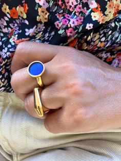 Discover the exquisite collection of handcrafted gold rings at Christina Christi Store on Etsy.com. Embrace elegance and uniqueness with our stunning designs. The first ring showcases a mesmerizing round shape with enchanting blue enamel, while the second ring boasts a sleek solid bar design. Both versatile pieces are slightly adjustable for a perfect fit. Shop now and adorn your fingers with these exclusive treasures from Christina Christi Store. 👉 My Rings Collection: https://etsy.me/2z6Fby0 Classic Gold Enamel Ring With Gemstone, Gold Plated Blue Rings As Gift, Blue Gold Plated Rings As Gift, Blue Gold Plated Rings For Gift, Classic Gold Open Enamel Ring, Blue Gold-plated Rings For Gifts, Modern Gold Plated Stackable Rings As Gift, Modern Gold Plated Stackable Rings Gift, Gold Stackable Gemstone Open Rings