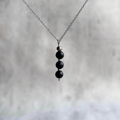 "Shungite pendant necklace for women - executes an effortlessly elegant hint of sparkle to any outfit.  Explore ways to layer this piece or wear it on its own for a minimal look. Dainty, minimal, stylish necklace. Great gift idea for women (wife, girlfriend, mom, sister...). Please select your necklace size from a drop-down menu from 14' (35 cm) to 24' (60 cm). To get the right necklace size for you: * Take a string or a piece of ribbon etc. * Wrap around your neck to the desired spot for wearin Minimalist Pendant Charm Necklaces For Meditation, Adjustable Minimalist Necklace With Rectangular Pendant, Minimalist Crystal Pendant Necklace For Meditation, Minimalist Pendant Crystal Necklace For Meditation, Minimalist Crystal Necklaces With Round Natural Stone Pendant, Minimalist Crystal Necklace With Round Natural Stone Pendant, Minimalist Crystal Necklace With Round Pendant, Minimalist Black Necklace For Gift, Minimalist Silver Onyx Necklace