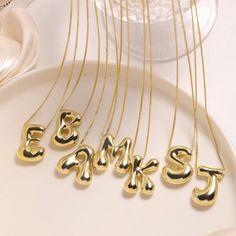 Elevate your style with our Gold Color Chunky Stainless Steel Waterproof Monogram Necklace. Made of durable and trendy stainless steel, this necklace features a bold and eye-catching gold color. Choose your own initial to add a personal touch and make a statement. A perfect gift for yourself or a loved one. Bubble Letter, Letter Jewelry, Letter Pendant Necklace, Initial Necklace Gold, Monogram Necklace, Waterproof Jewelry, Letter Pendants, Unisex Jewelry, Chunky Necklace