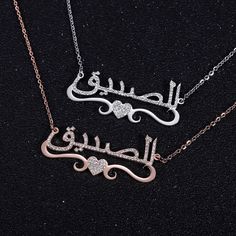 Free US Shipping - This Week Only! •Starting under $60 today only! •Buy Now Pay Later with QuadPay interest free installment payments! Just choose QuadPay when you add to cart! These stunning, high quality laser cut Arabic Script Custom Name Pendant Necklaces With Heart Accent scream elegance and style! Goes with every look and comes in Rose Gold or Platinum Plated! We have the best quality & the best prices for custom jewelry! *Include desired name in add to cart notes, or email to info@starcro Customized Rose Gold Necklace As A Gift For Her, Rose Gold Valentine's Day Pendant Name Necklace, Customizable Rose Gold Necklaces For Valentine's Day, Customized Rose Gold Necklace For Valentine's Day, Customizable Rose Gold Necklace For Valentine's Day, Customized Heart-shaped Rose Gold Necklaces, Customized Rose Gold Heart Necklaces, Customized Rose Gold Heart Pendant Necklace, Customizable Rose Gold Heart Necklace For Valentine's Day