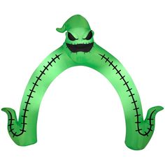 an inflatable arch with a green monster head on it's face and two hands