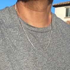 Men's and women's tennis chain necklace. Real genuine solid 925 sterling silver chain. Choose 16"-22", chain measures 2MM thick Authentic D Color VVS1 moissanite stones. Second hardest to diamonds on the Mohs scale. M 925 is stamped on the single latch clasp. Pass a diamond tester pen (as shown in photo) Shows up as moissanite (not diamond) on lab assays. Weigh approx. 13-16 grams depending on length. Won't change color or ever turn your skin green. Look like $3000-$8000 diamond tennis chains. E Minimalist Silver Tennis Necklace With Diamond Cut, Minimalist Silver Diamond Cut Tennis Necklace, Silver Minimalist Tennis Necklace For Anniversary, Minimalist Silver Tennis Necklace For Anniversary, Silver Minimalist Tennis Necklace For Everyday Wear, Minimalist Silver Tennis Necklace For Everyday, Everyday Silver Minimalist Tennis Necklace, Everyday Minimalist Silver Tennis Necklace, Classic Silver Tennis Necklace For Everyday