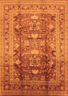 an orange and gold rug with many different designs on the border, in various colors