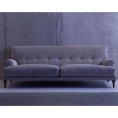 The SCP Oscar three Seater Sofa strikes a pleasing balance between modernity and tradition, large in size yet light in appearance. The large feather cushion is notable for its depth, the back has a line of sewn in pulls, lending the Armchair the appearance of a buttoned back, without the actual buttons.  The feet are made from walnut stained beech, with the front two being turned versions. This version is finished in Romo Linara fabric. Sofa Bed Bedroom, Bed Stool, British Furniture, Chair Sofa Bed, Bedside Table Storage, Large Feathers, Modular Shelving, Three Seater Sofa, Bookcase Shelves