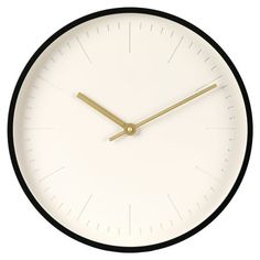 a black and white clock with gold hands on a white background is shown in this image