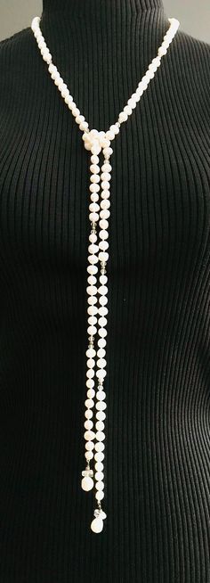 ♥️Genuine Knotted Opera Length Pearl Lariat.  Just a single strand but incredibly versatile.  There are many ways to wear this lovely style. Just loop it at the front, double wrap and pull through the loop at the neck for a choker style.  The list goes on!  These AAA quality pearls make an elegant accessory to compliment and elevate any outfit.  ♥️ Single Strand Lariat Necklace With Round Beads, Formal Adjustable Multi-strand Necklace, Adjustable Double Strand Formal Necklace, Elegant Adjustable Single Strand Beaded Necklaces, Elegant Single Strand Adjustable Beaded Necklaces, Elegant Adjustable Beaded Lariat Necklace, White Single Strand Lariat Necklace, Elegant Adjustable Lariat Necklace With Round Beads, Classic Single Strand Lariat Necklace