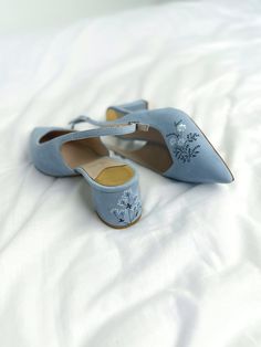 Wedding slingback pumps 'Tati' are handcrafted from something blue Italian suede. The pair of bridal heels features handmade floral embroidery with wildflowers and vines that can be customized to your preference.  This design also has pointy toes and 5.5 cm / 2.2 inches stable block heels that are also embroidered in the same pattern. These wedding shoes are designed with a V-notched vamp (v-cut) and closed toe which makes bridal sandals even more elegant and special. Take note that the base of Blue Bridal Shoes Low Heel, Blue Open Heel Wedding Shoes, Wildflower Embroidery, Stable Block, Fun Wedding Shoes, Wedding Pumps, Shoes Socks, Bridal Sandals, Bridal Heels