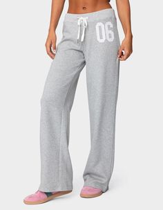 Reach Your Ultimate Level Of Coziness, While Still Feeling On-Trend With These Perfect Sweatpants. Sweatpants. Straight Leg Fit. Adjustable Tie Waist. Embroidered Patch. 50% Cotton, 50% Polyester. Model Wears Size S. Model Height Is 5'8. Item Care: Machine Wash At Maximum 30ºc, Do Not Bleach, Do Not Tumble Dry, Iron At A Maximum Of 110ºc, Do Not Dry Clean. | Edikted 06 Sweatpants Good Sweatpants Brands, Wide Legged Sweatpants, Shirts To Wear With Sweatpants, Good Sweatpants, 2000s Sweatpants, Pajamas Y2k, Sweatpants Graphic, Edikted Tops, Aphi Merch