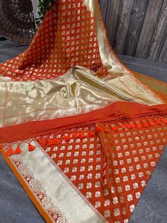 Dazzling orange vegan silk Banarsi saree with dense gold zari butas and a grand palla! Blouse fabric included. Fall attached. Note: The color of the products may slightly vary according to the lighting conditions and the color calibration of the viewing LED devices. If you would like more clarity before your purchase, please drop us a message . Banarsi Saree, Blouse Fabric, Color Calibration, Halloween Shopping, Saree, Orange, Bathing Beauties, Pet Supplies, Accessory Gift