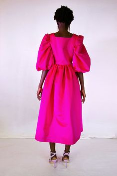 Product description : Maxi summer dress in fuchsia satinHeart-shaped neckline and puffy sleeves. Invisible zip at side. Our model is 5'11" (1m80) and wears a size 36 (French size) Fabric: 58% PL 42%AC , from SpainMade in FranceCare Instructions : Dry clean onlyABOUT THE BRAND : DIANE Paris creates joyful clothing for special occasions and to make you everyday happy. A colourful wardrobe made with love in our Parisian workshop with sustainability in mind and a passion for the perfect cut that wil Voluminous Puff Sleeve Dress For Spring Evening, Pink Satin Midi Dress For Gala, Voluminous Puff Sleeve Evening Dress For Spring, Puff Sleeve Dress With Fitted Bodice For Gala, Voluminous Ruched Puff Sleeve Dress For Party, Party Dresses With Structured Shoulders And Bishop Sleeve, Fitted Bodice Puff Sleeve Dress For Gala, Formal Pink Fitted Puff Sleeve Dress, Voluminous Ruched Puff Sleeve Party Dress