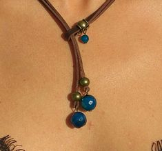 "Lariat necklace, leather necklace, stone necklace, necklace for woman belong to bohemian jewelry as well as boho jewelry. A gemstone jewelry piece carefully designed and crafted by EndiaDesign. Show off a bohemian style with this unique leather necklace made of high quality cow leather, agates stones in blue colour and a beads in antique bronze tone. You could wear this original gemstone necklace on any occasion, formal or casual, making you look super chic and cute. Agate Healing Properties ♥ Adjustable Dangle Lariat Necklace For Festival, Handmade Adjustable Bohemian Lariat Necklace, Bohemian Lariat Necklace With Adjustable Length For Festivals, Bohemian Lariat Necklace With Adjustable Length, Bohemian Long Lariat Necklace With Adjustable Length, Unique Adjustable Lariat Necklace, Bohemian Lariat Necklace With Natural Stones For Festivals, Unique Adjustable Lariat Necklace With Natural Stones, Bohemian Adjustable Lariat Necklace For Festivals