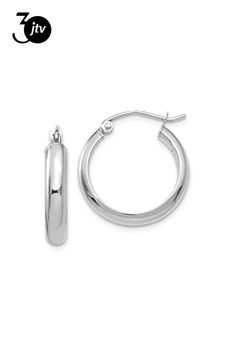 Rhodium over 14K white gold hoop earrings. Measure approximately 13/16"L x 1/8"W and have saddleback backings. Classic Small Hoop Sterling Silver Jewelry, Classic Sterling Silver Hoop Earrings For Pierced Ears, Silver Oval Tarnish Resistant Hoop Earrings, Silver Round Cut Tarnish-resistant Earrings, Classic White Gold Hoop Earrings, Silver Tarnish-resistant Round Cut Earrings, Silver Tarnish Resistant Earrings, Everyday White Gold Rounded Jewelry, Classic Nickel-free Huggie Earrings