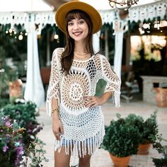 Embrace beachside elegance with our Anna-Kaci Women's White Crochet Cover Up Bathing Suit. Crafted from a blend of 65% Cotton and 35% Polyester, this cover-up features intricate crochet patterns and fringe trim for a stylish beachwear look. Summer Crochet Top For Vacation Beach Cover-up, White Crochet Beachwear Dress For Poolside, White Crochet Dress For Poolside In Spring, White Crochet Dress For Poolside Spring Occasion, White Crochet Dress For Poolside Spring Events, White Crochet Dress For Beach Party Vacation, White Crochet Dress For Poolside And Beach Season, White Cover-up For Beach Season Festivals, Hippie Style Cover-up For Spring Beach Party