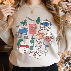 Nurse Stethoscope Christmas Shirt, Gift For Nurse, Stethoscope Tree Shirt, Healthcare Worker Shirt, Nurse Holiday Shirt, CNA Christmas Gift by MomentInDesign on Etsy Holiday Cna Shirts, Nursing Christmas Shirts, Themed Doodles, Er Nurse Christmas Shirts, Womens Christmas Shirts Nurse, Nurse Fashion, Holiday Doodles, Nurse Clothing, Holiday Nurse Shirt