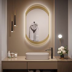 a bathroom with a sink, mirror and towel on the wall above it is illuminated by lights