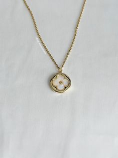 A luxurious lucky clover necklace that's so stunning on and matches everything. An absolute essential in every jewelry collection. Our chains are 100% stainless steel and hypoallergenic so they won't rust, tarnish, or turn your neck green. - Stainless steel chain - Lobster clasp closure - Cubic zirconia gold filled pendant - Select desired size / color at checkout Elegant Stainless Steel Flower Pendant Necklace, Elegant Stainless Steel Flower Pendant Jewelry, Luxury Stainless Steel Necklaces, Luxury Round Stainless Steel Necklace, Luxury Stainless Steel Round Necklace, White Stainless Steel Necklaces, Tarnish Resistant, White Stainless Steel Necklace Tarnish Resistant, White Tarnish-resistant Stainless Steel Necklace, White Stainless Steel Tarnish-resistant Necklace