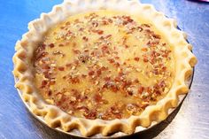 a pie sitting on top of a wooden table