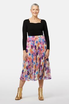 print Chic Long Floral Print Pleated Skirt, Chic Long Pleated Skirt With Floral Print, Silk Accordion Pleated Flowy Skirt, Voluminous Skirt With Pleated Hem For Party, Spring Silk Skirt With Pleated Waist, Chic Floral Print Pleated Skirt For Spring, Evening Floral Print Flared Skirt, Floral Print Flared Evening Skirt, Evening Flared Skirt With Floral Print