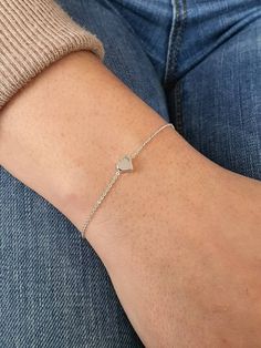 Dainty Tiny Heart Bracelet, Gold Plated Heart Charm, Monogram Letter Bracelet, Bridesmaid Gift, Girlfriend Gift, Personalized, Lovers Gift Treat yourself to the minimalist look of this gold plated heart bracelet. It looks just as amazing worn by itself, as it does stacked with one of our bracelets available in our store. The heart measures approximately 1 cm and it moves loosely on the delicate cable chain. Also a perfect gift for your bff, your bridesmaids, or a special person in your life. Det Delicate Heart Bracelet With Heart Charm For Mother's Day, Dainty Heart Charm Bracelet For Wedding, Heart Charm Jewelry For Bridesmaid Gift, Heart-shaped Charm Bracelet For Wedding, Valentine's Day Heart Bracelet For Wedding, Delicate Silver Heart Bracelet With Charm, Delicate Silver Heart Charm Bracelet, Delicate Heart Bracelet For Wedding, Silver Bracelets For Bridesmaid Gift On Valentine's Day