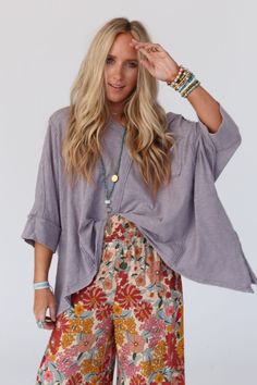 Get ready to show off your fun boho style in the Landon Oversized Top! With a relaxed fit and soft touch fabric, this top is perfect for you because it features: So soft, washed, knit fabric Oversized and flowy silhouette provides maximum comfort Flattering v neckline (Perfect to wear off the shoulder to show off all of your favorite bralettes!) Dolman style 3/4 length loose sleeves Uneven bottom edge creating a flowy boho look Exposed seams and raw edges throughout for added boho style Cassic, Boho Outfit, Padded Bralette, Exposed Seams, Loose Sleeves, Oversized Top, Boho Look, Large Bust, Raw Edge, Flare Pants