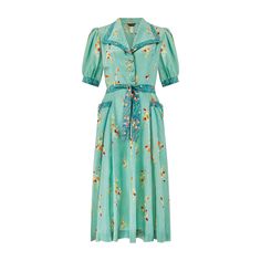 This 1970s does 1940s summer dress is by celebrated British designer Jeff Banks.  The influential designer was a pivotal member of the swinging 60s London fashion scene when he cofounded 'Clobber' in Blackheath Village, London, in 1964. The boutique carried both his own designs and the work of other designers and attracted celebrities such as Terence Stamp and Jean Shrimpton, Twiggy and some of the Beatles. It proved such a success that in 1969, he launched his own fashion label, opening the first standalone Jeff Banks shop, as well as retail outlets in twenty-two department stores including Harrods and Harvey Nichols.  Tailored from a seafoam green, viscose-cotton blend with a slight shine to the finish, it is printed with leaves and florals in bold hues of yellow, pink, orange and red. C Spring Green Vintage Dress With Floral Print, Green Retro Maxi Dress With Floral Print, 1970s Style Vintage Print Spring Dress, 1970s Green Floral Print Dress, Fashion Souls, 1970s Floral Print Maxi Dress, Jean Shrimpton, Harvey Nichols, Banks