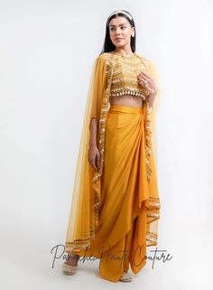 Mustard Yellow Color Dhoti Skirt Set – Panache Haute Couture Gold Tissue Silk Palazzo Set With Traditional Drape, Gold Silk Palazzo Set With Traditional Drape, Tissue Silk Palazzo Set With Zari Work, Festive Tissue Silk Palazzo Set, Eid Tissue Silk Palazzo Set, Eid Tissue Silk Palazzo Set With Traditional Drape, Tissue Silk Palazzo Set With Traditional Drape For Eid, Navratri Silk Palazzo Set With Traditional Drape, Navratri Reception Set With Traditional Drape