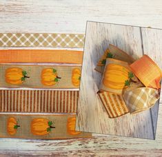 an orange ribbon with pumpkins on it