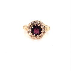 Vintage 1940's 10k yellow gold purple stone halo ring. The center stone is the color of a beautiful deep purple amethyst. The size of the ring is a 6, and has the ability to be resized. Purple Sapphire Ring With 14k Gold Prong Setting, Purple 14k Gold Fine Jewelry Rings, 14k Gold Ring With Purple Center Stone, Heirloom 14k Gold Round Cut Amethyst Ring, Purple 14k Gold Ring With Center Stone, 14k Gold Purple Diamond Ring, Formal 14k Gold Amethyst Ring With Center Stone, Heirloom 14k Gold Purple Birthstone Ring, Heirloom Purple Birthstone Ring In 14k Gold